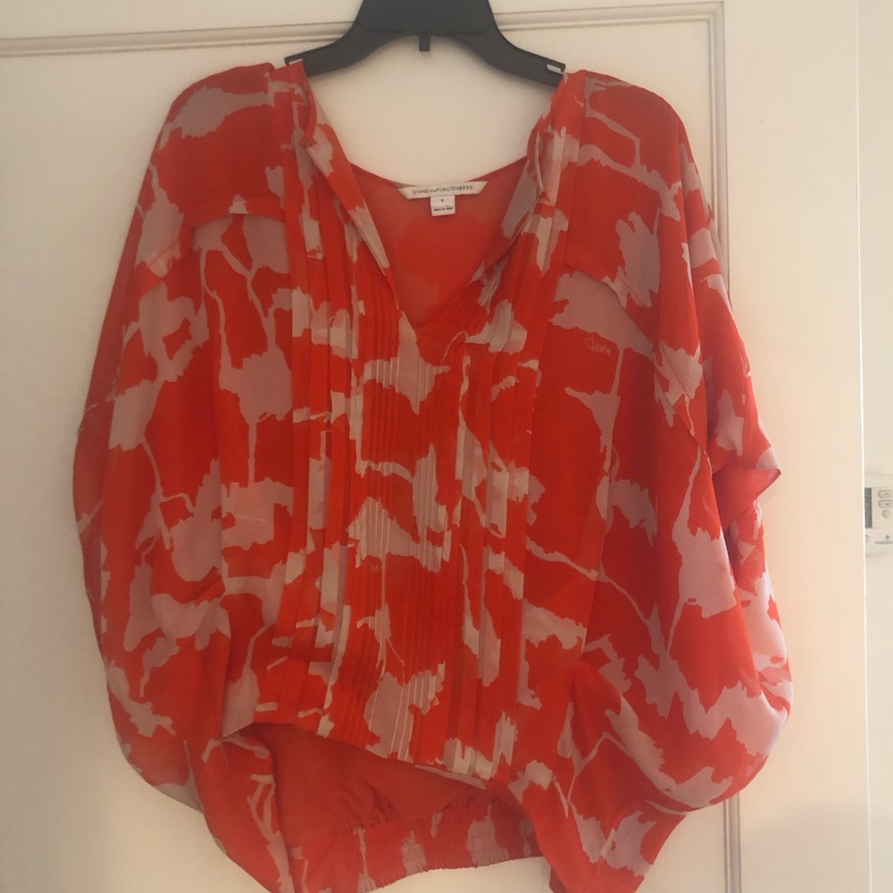 Orange Diane Furstenberg silk blouse